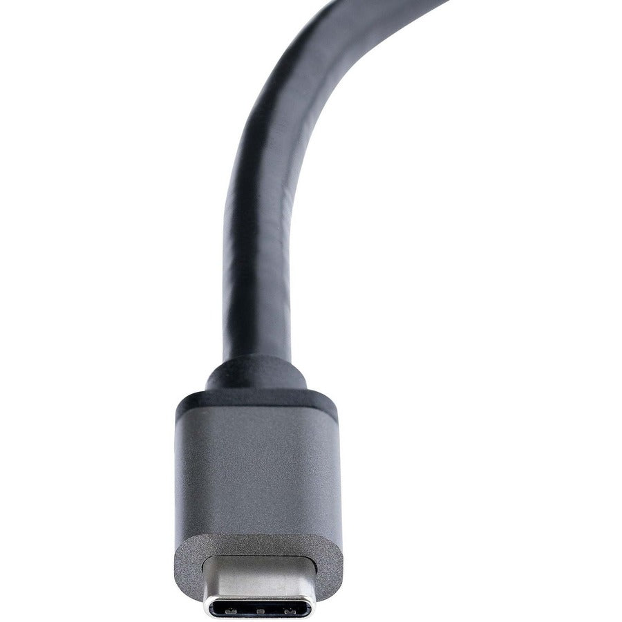 A StarTech.com USB-C to Dual HDMI Adapter with a gray body and a long black cable ending in two HDMI connectors.